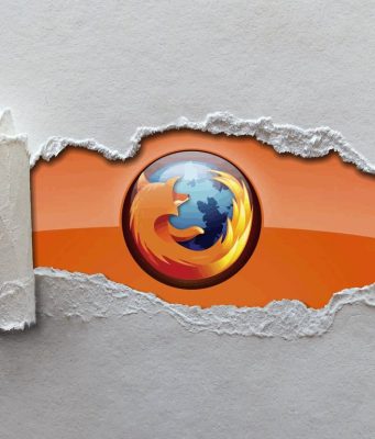 Se puede ver el logotipo de Firefox (el zorro rojo en torno a la bola del mundo) aparecer de detrás de un papel rasgado de color gris
